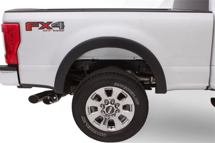Bushwacker 16-18 Nissan Titan XD Pocket Style Flares 2pc 78.0in Bed – Black