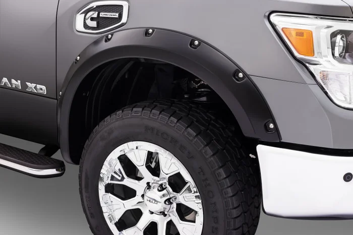 Bushwacker 16-18 Nissan Titan XD Pocket Style Flares 4pc 78.0in Bed – Black